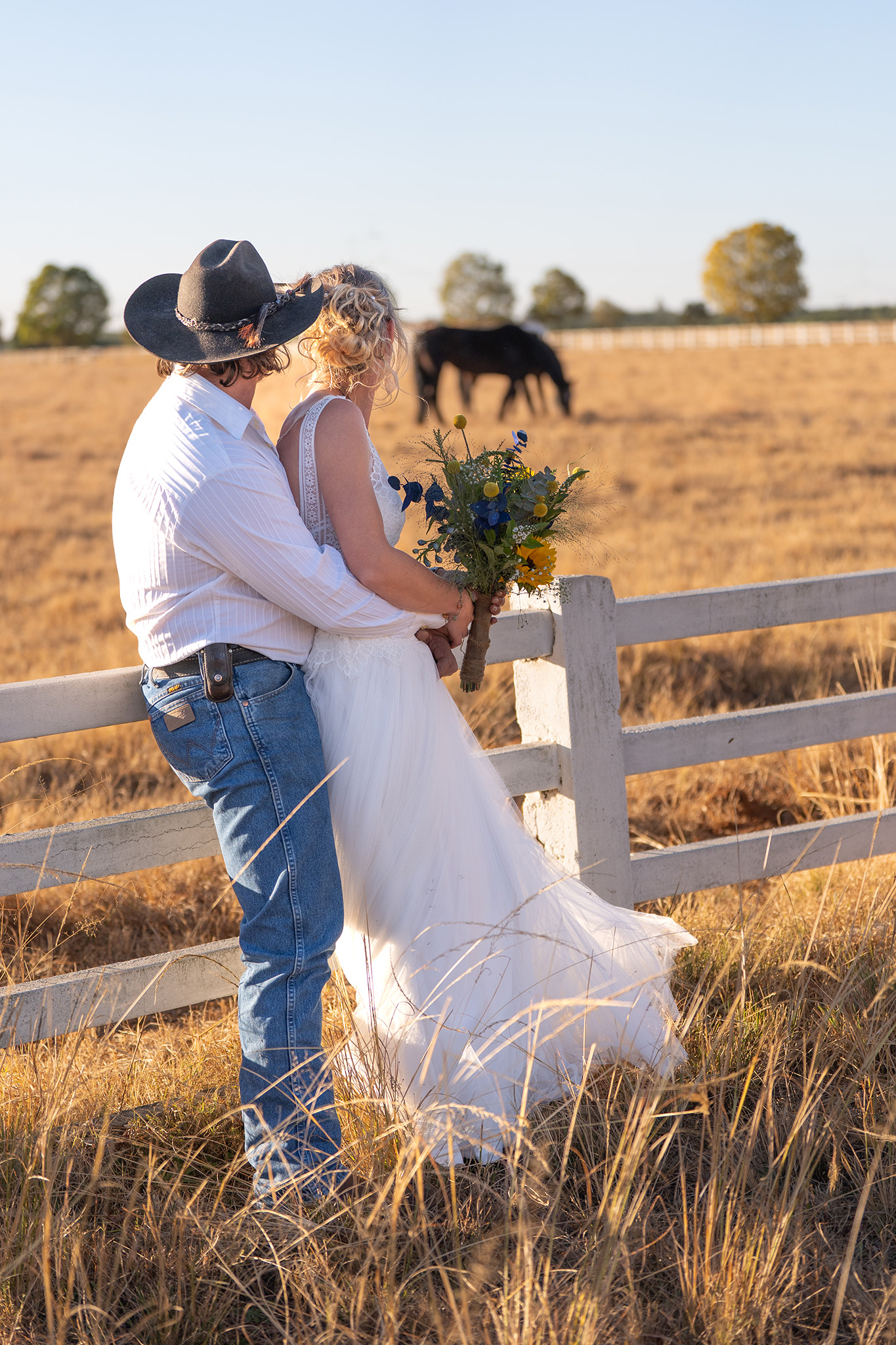Horsey wedding photography in paddock
