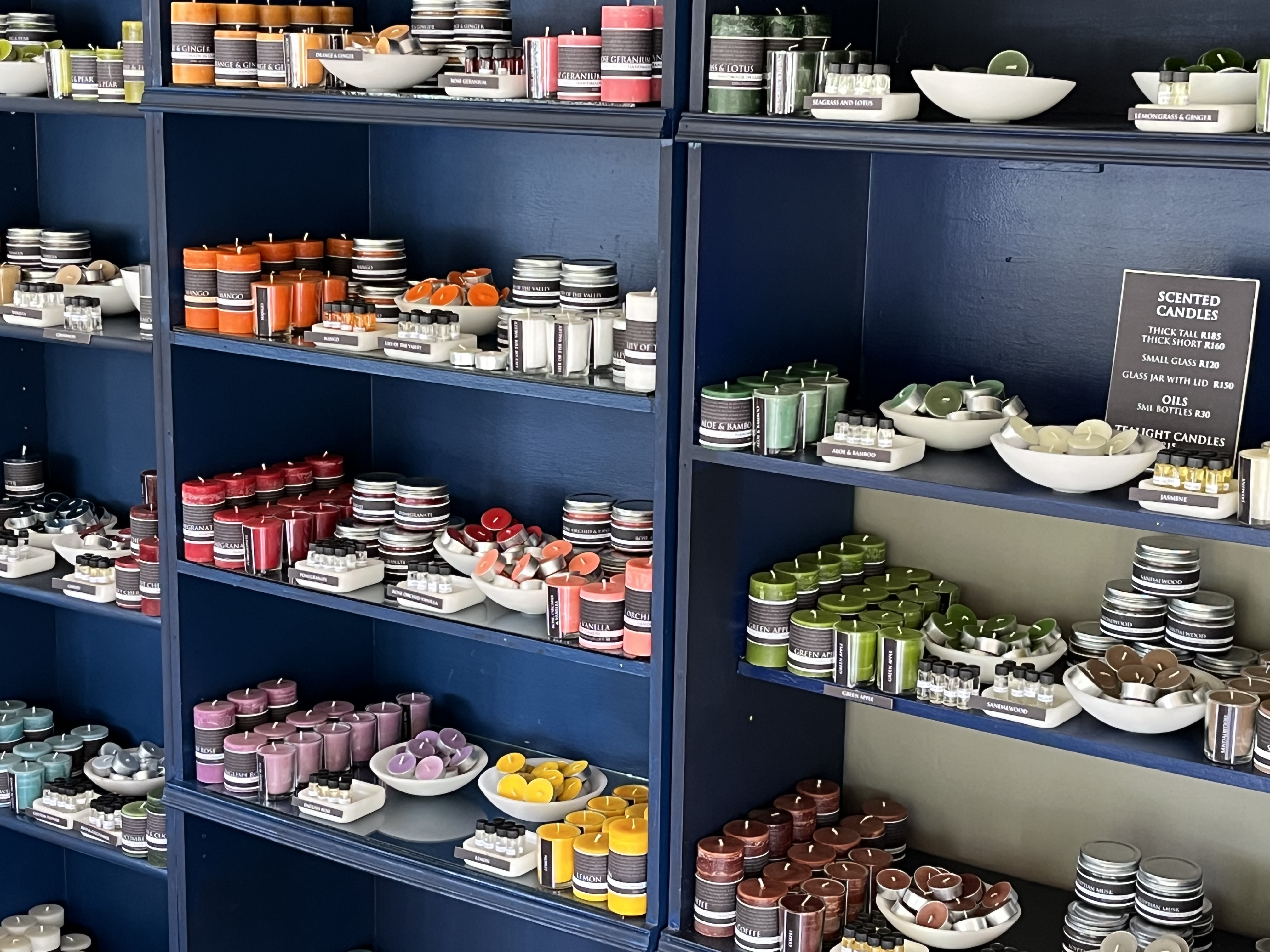 Discover our exquisite collection of hand-poured scented candles and tealights, available in over 25 captivating fragrances to suit every mood and moment. 