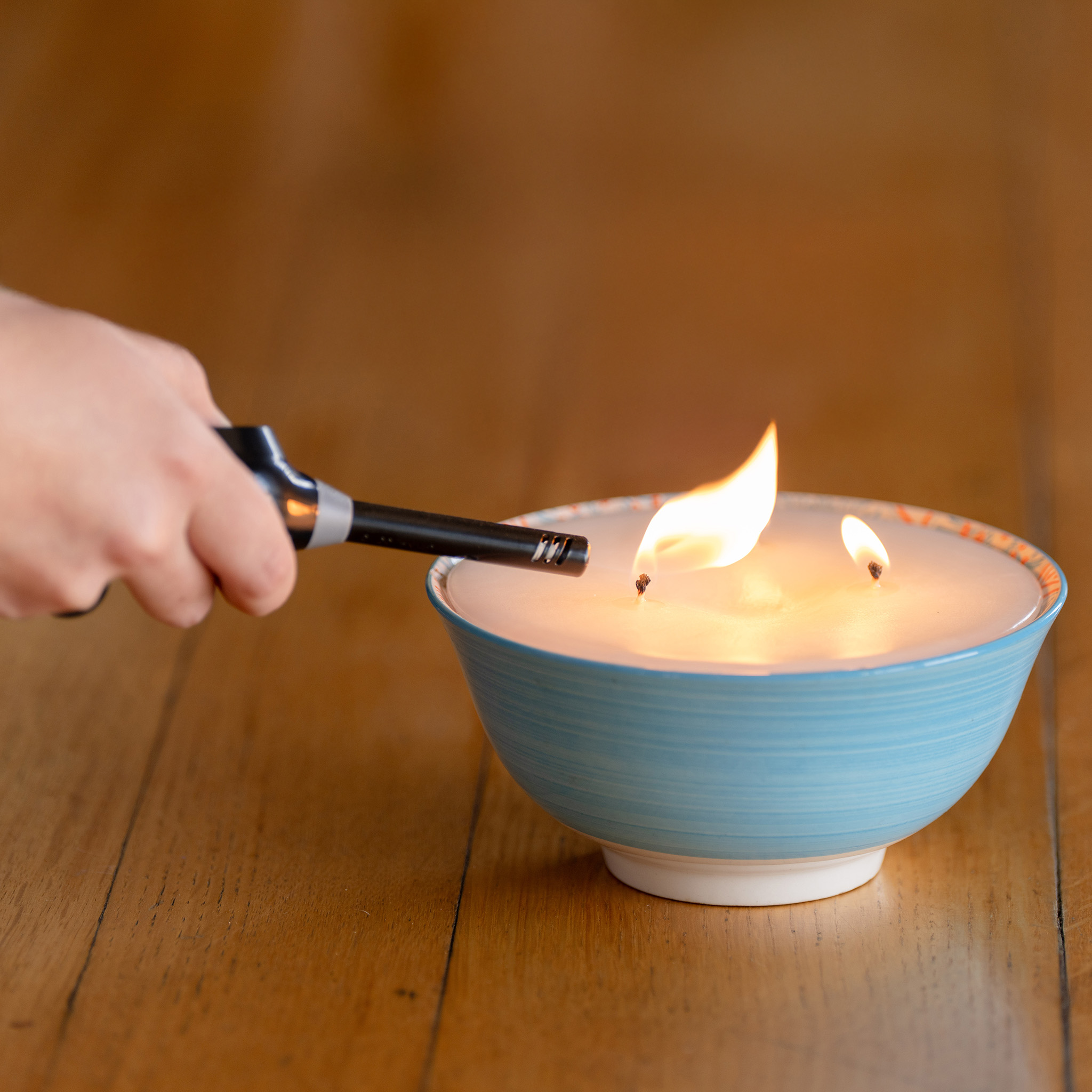 Lighting a Stephanis's scented candle