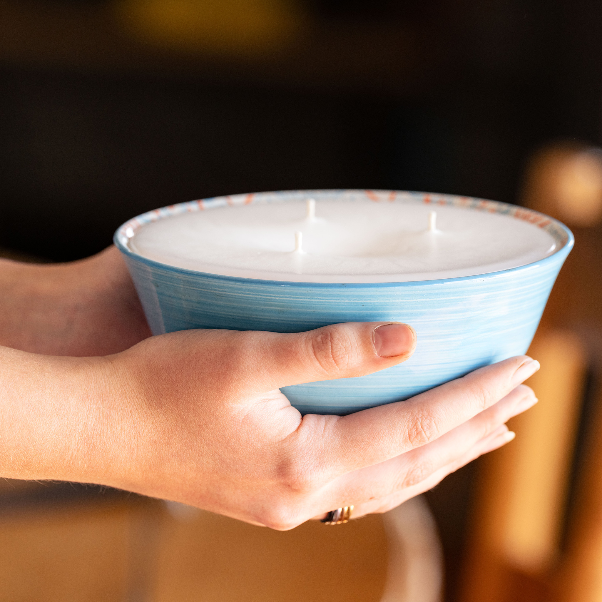 image of a stephani's scented candle in colourful ceramic pot