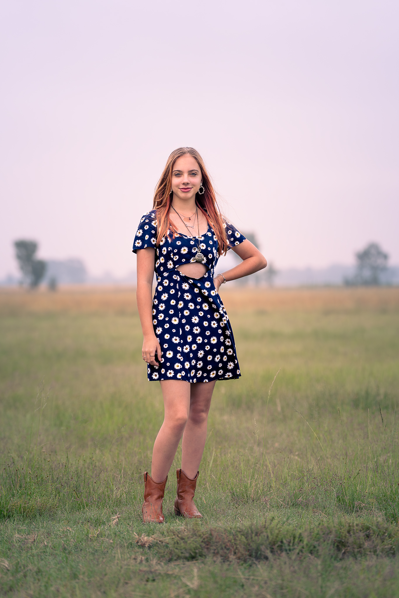 Model in floral blue dress