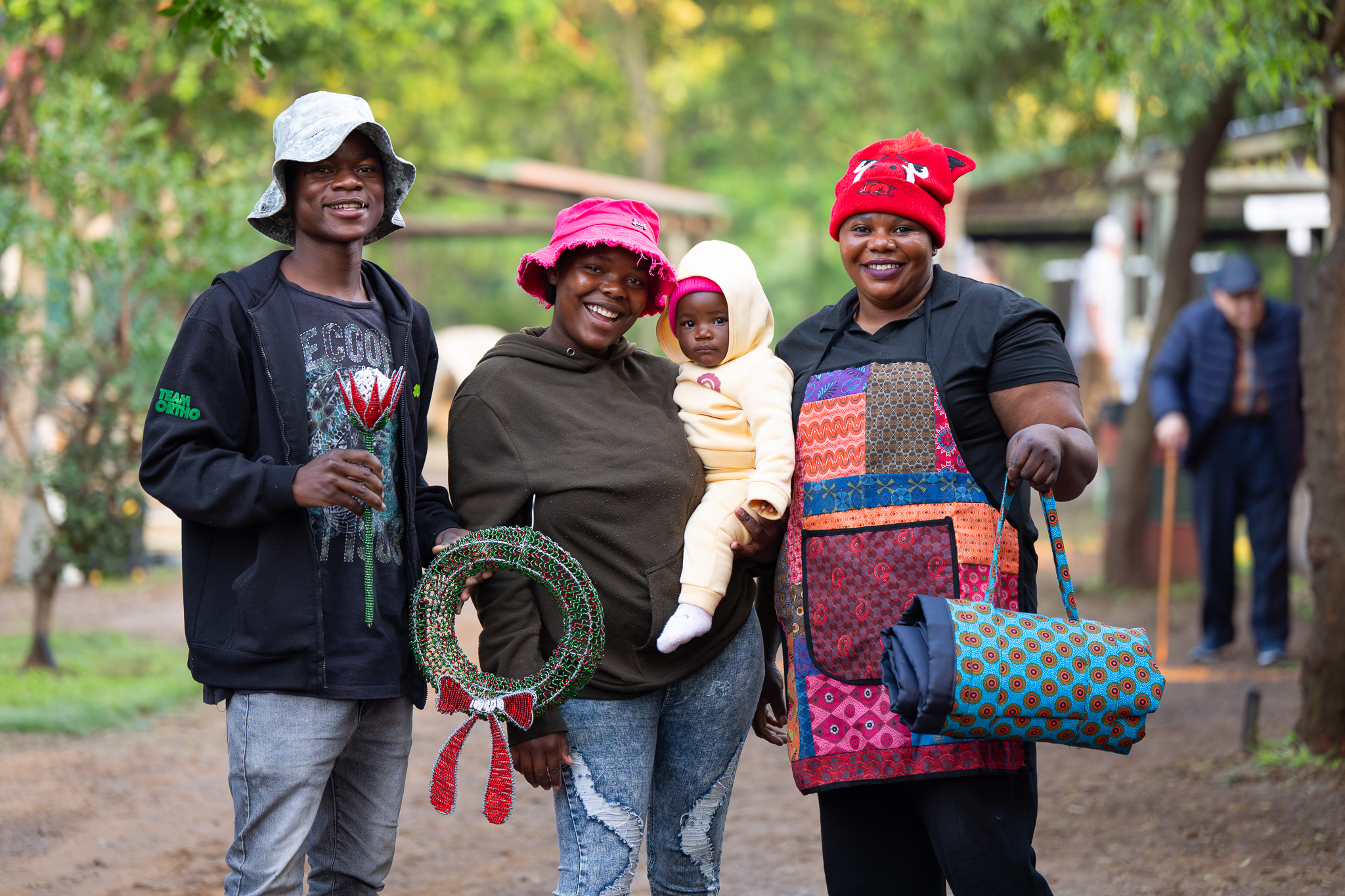 Portrait of a friendly family at the farmer's market