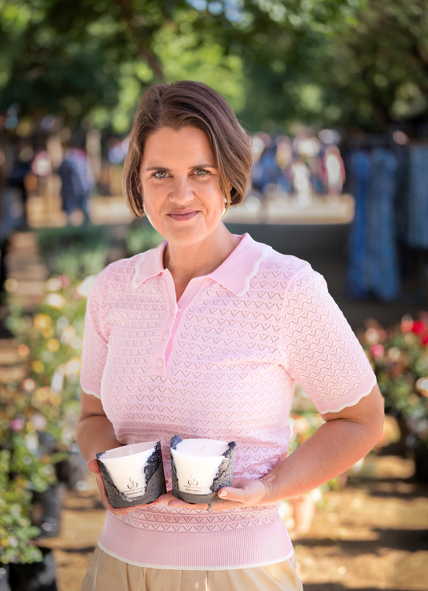 Stephani with her scented candles at the market