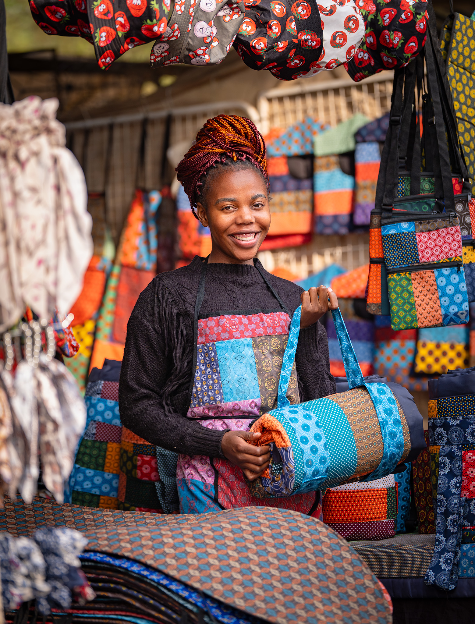 Ladywith colourful merchandise at the Pretroia Boeremark