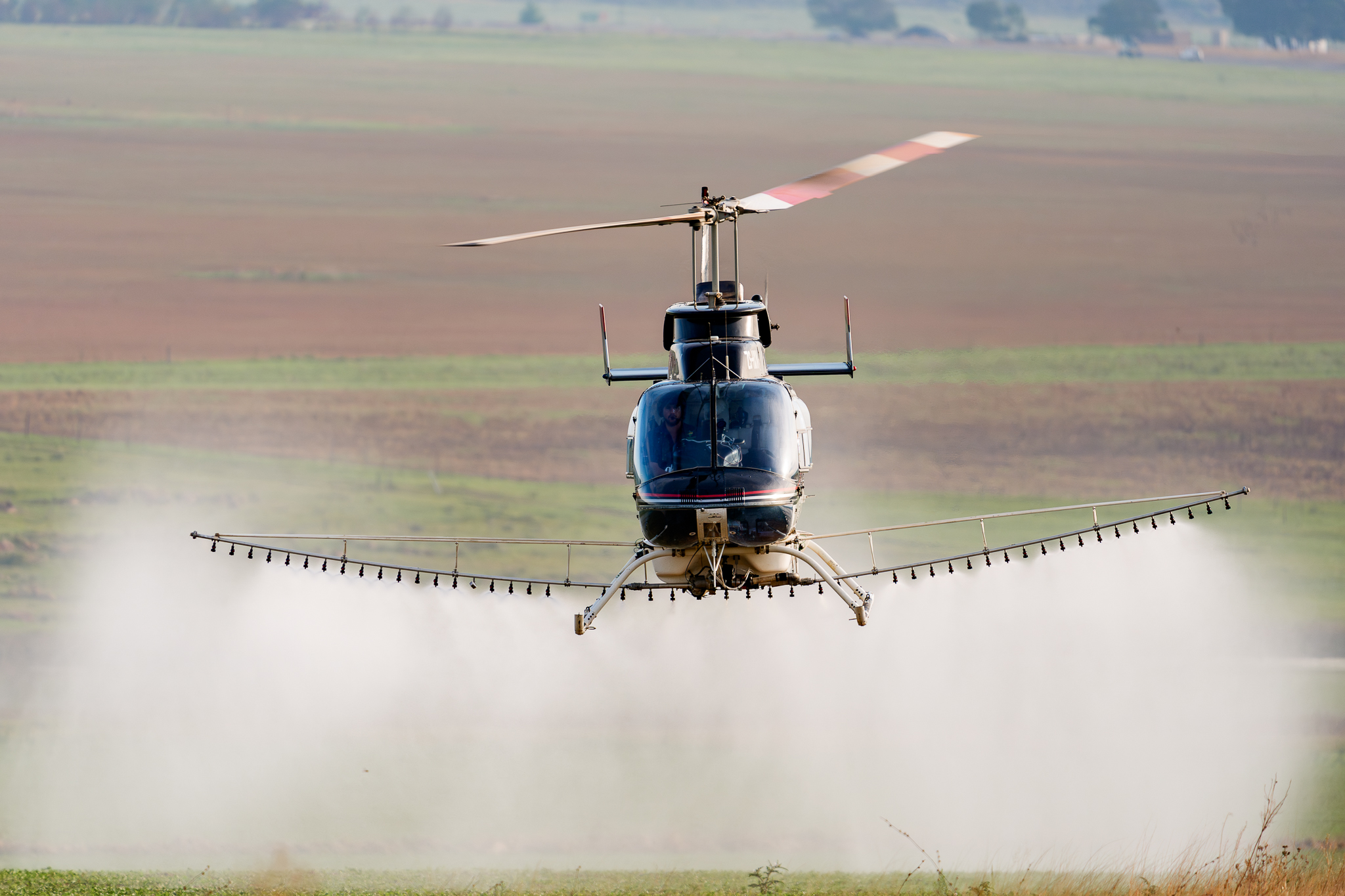 Action image of Chopper Crop Spraying at work