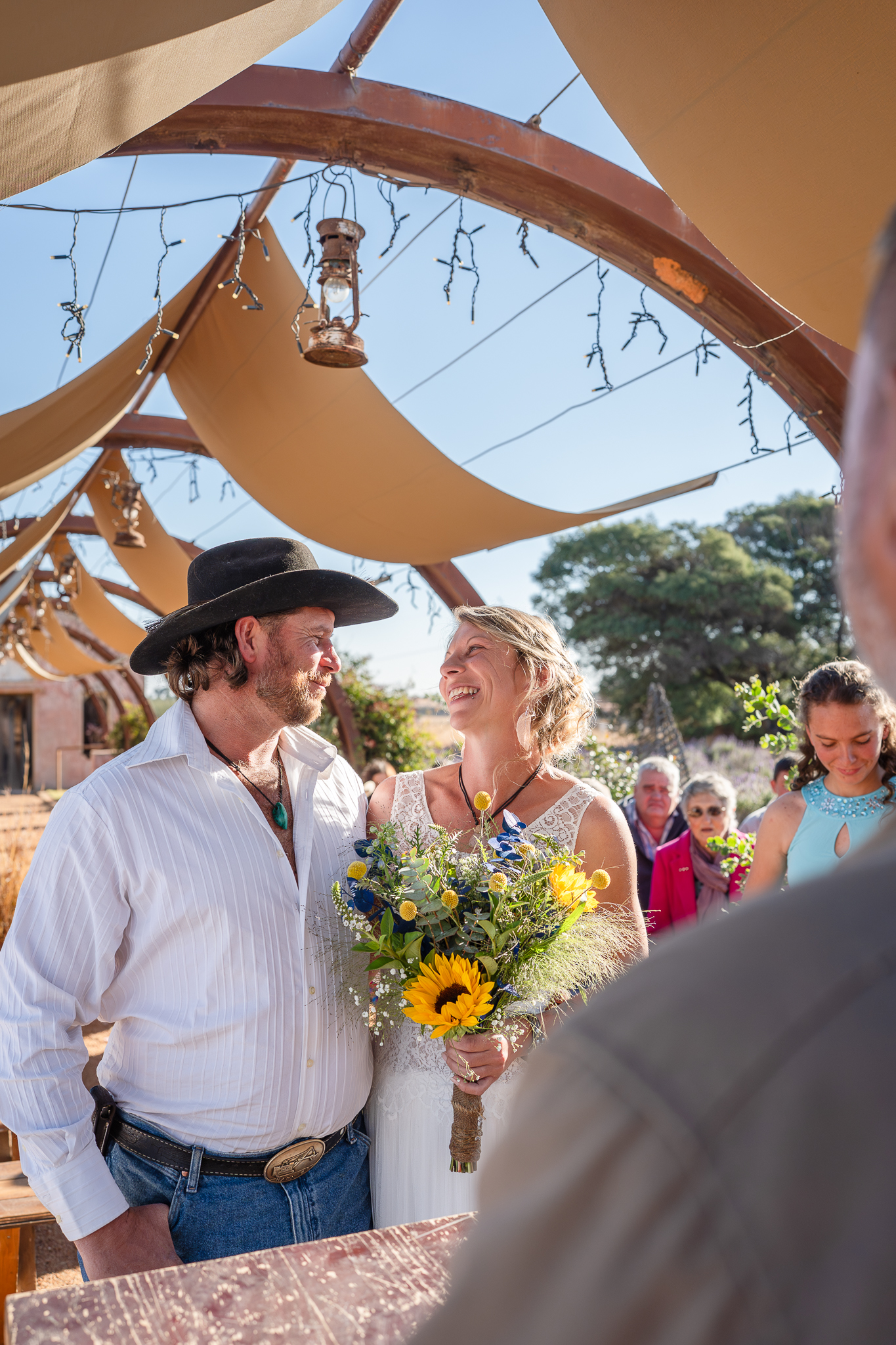 Colourful image of bride and groom during their wedding ceremony