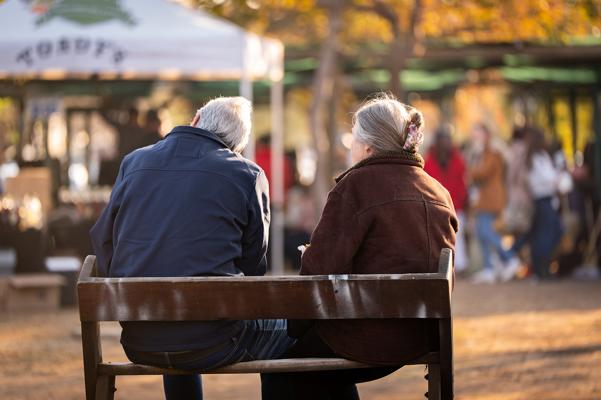 An elederly couple enjoying the autumn afternoon at a local market in Pretoria