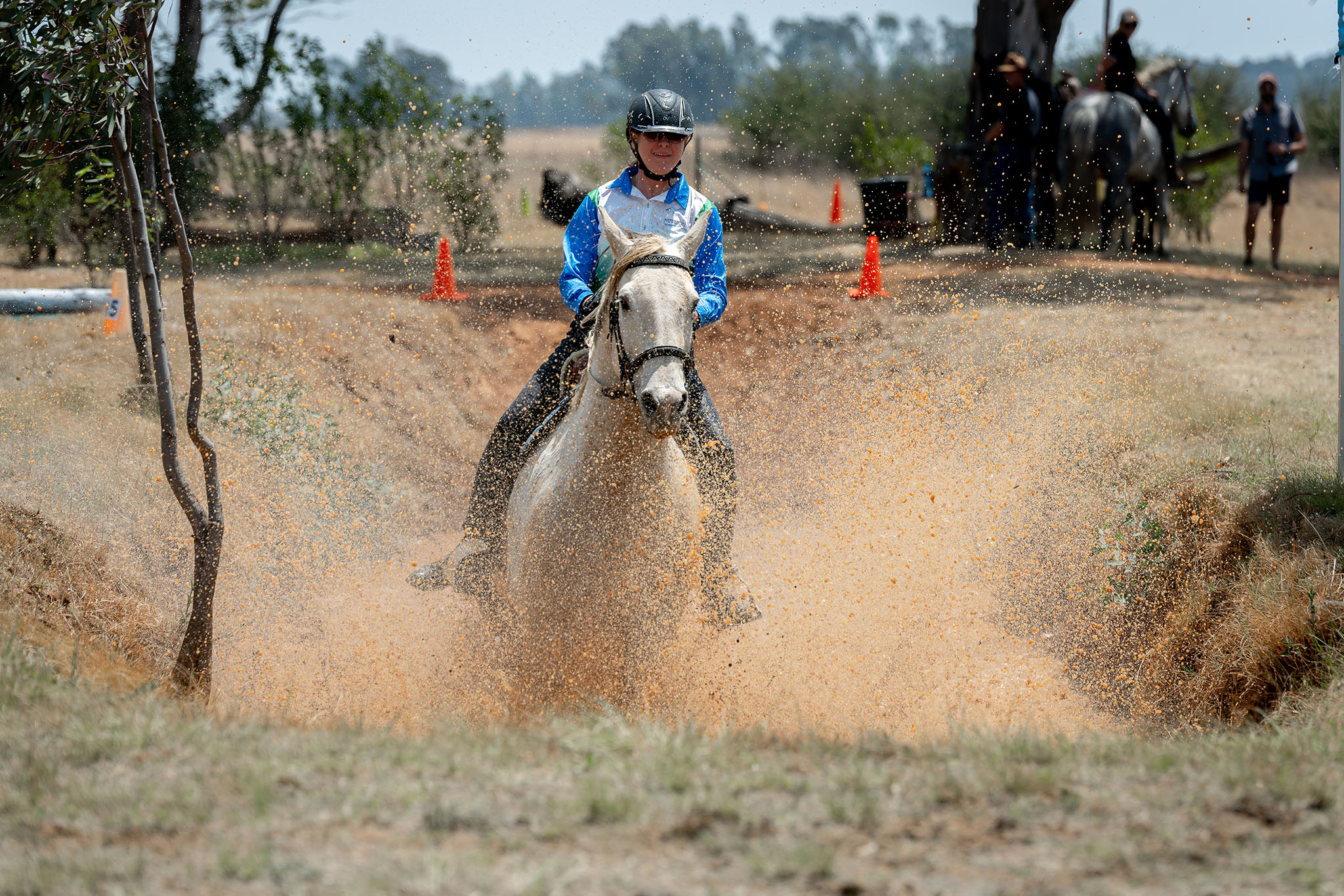Equestrian event image of a rider going through the wate
