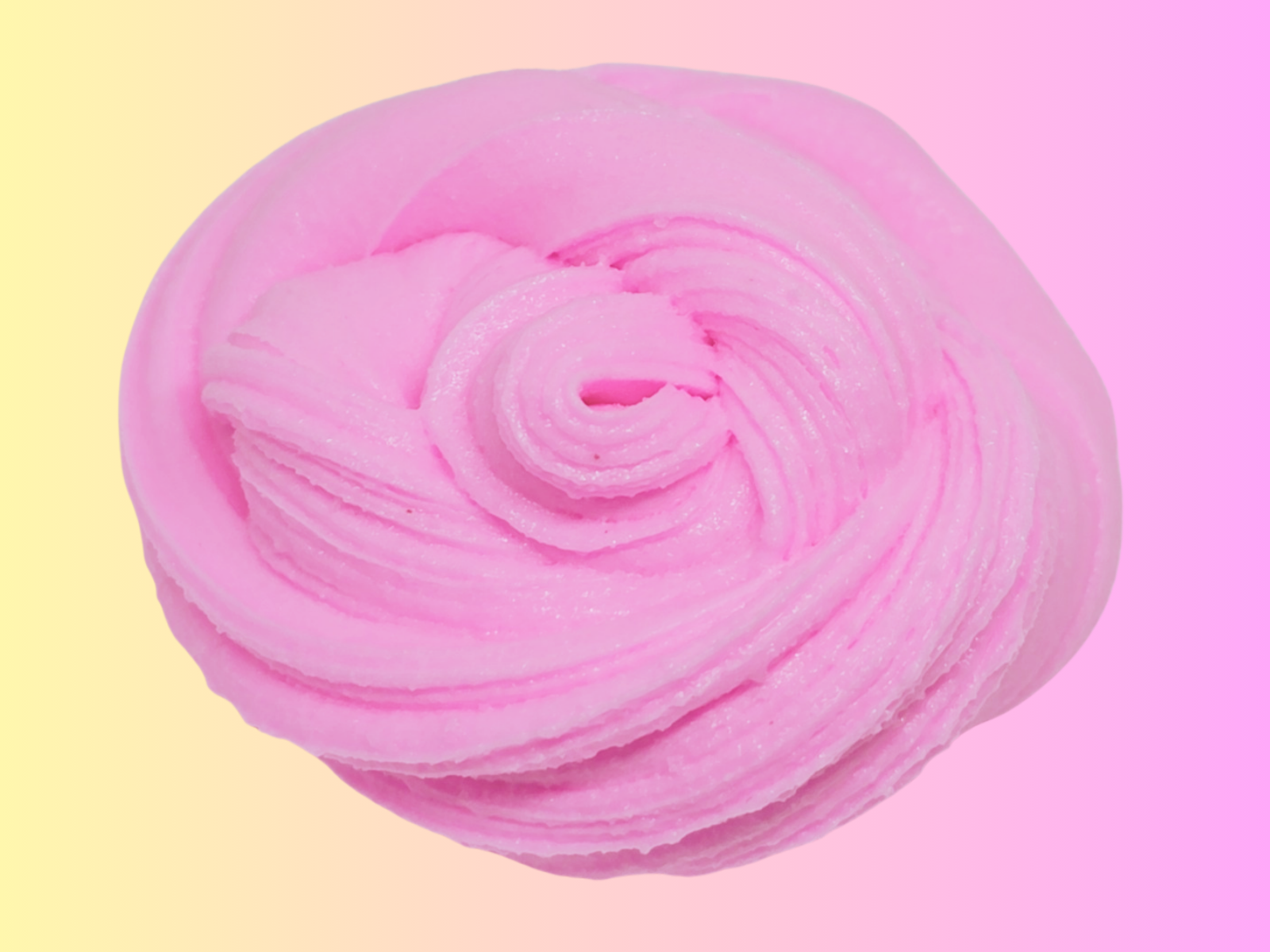 A soft pastel pink swirl of spreadable icing slime looks like frosting from Lilakawaii by Slime Design