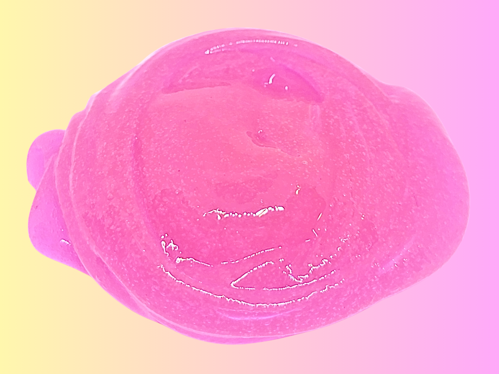 A transparent swirl of pink clear slime from Lilakawaii by Slime Design