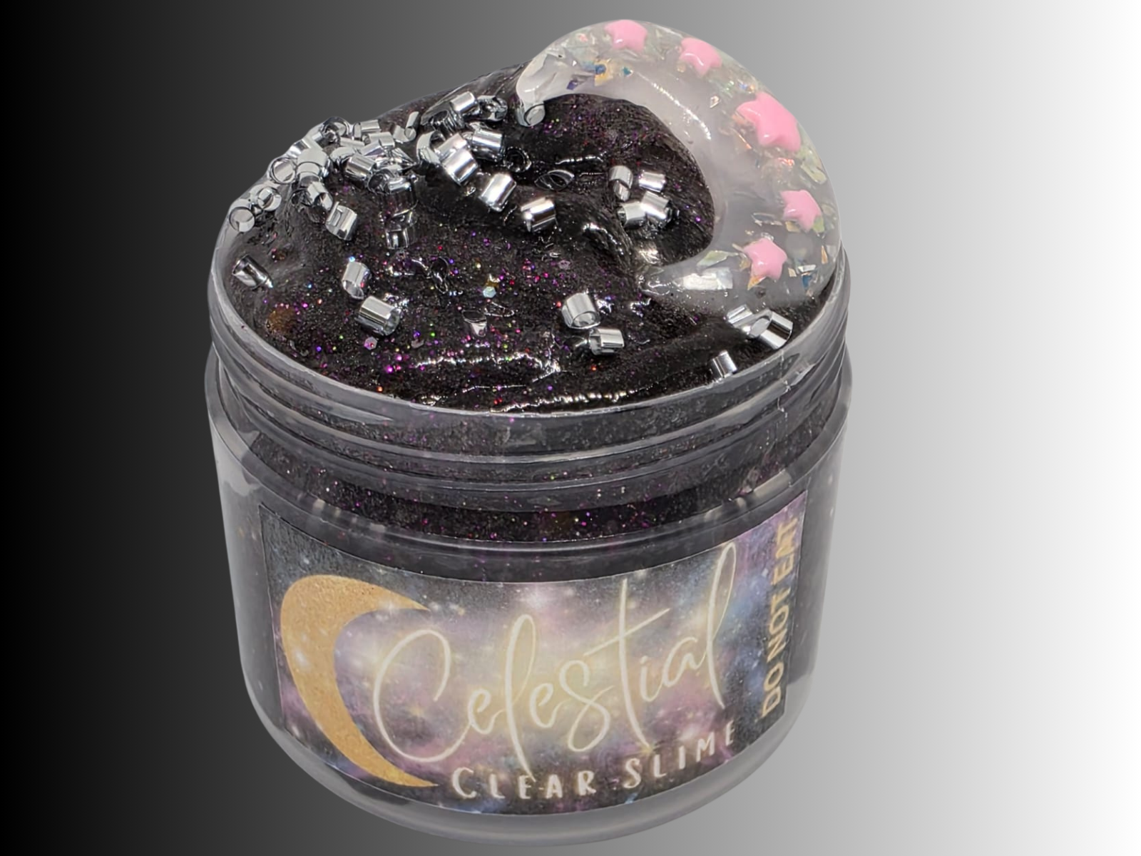 Tub of black clear slime with sparkly bingsu and glitter topped with a cute moon charm - Celestial theme