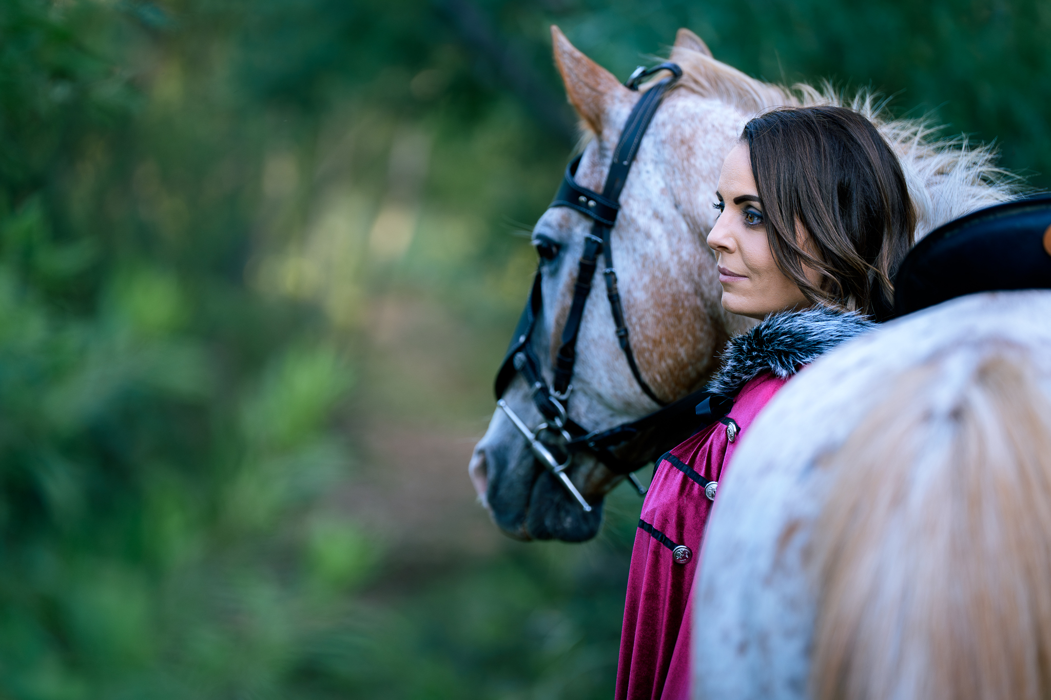 Portrait of a woman and her horse in a wooded environment during a guided lifestyle photography session