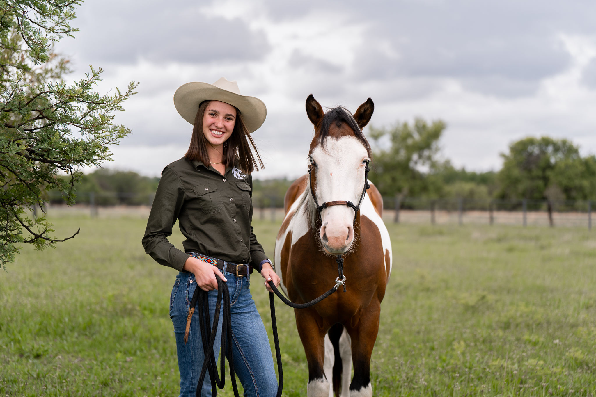 Portrait of an equestrian student and ther horse