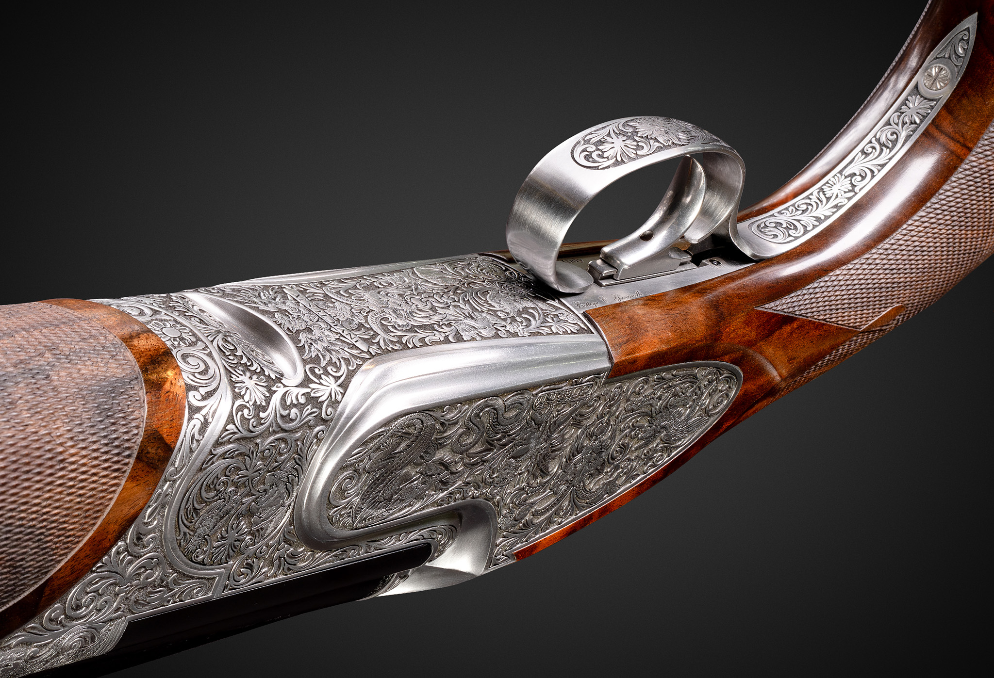 Bespoke product image of gand crafted shotgun on grey background