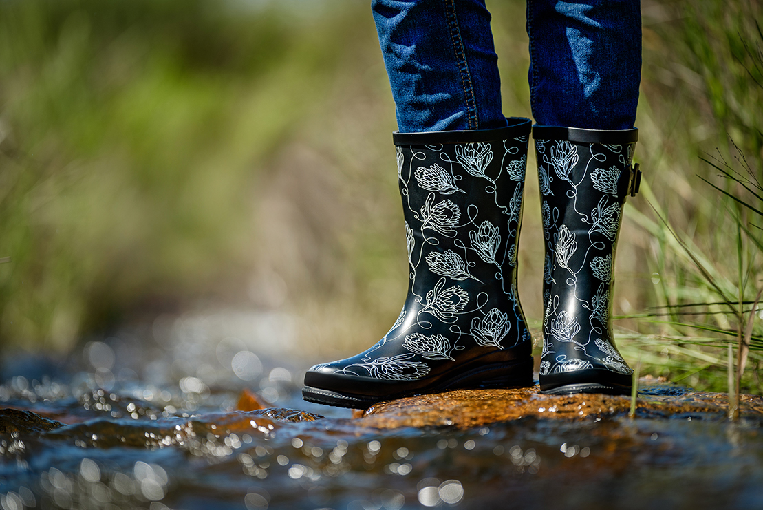 Image of natural rubber wellington boots worn in water