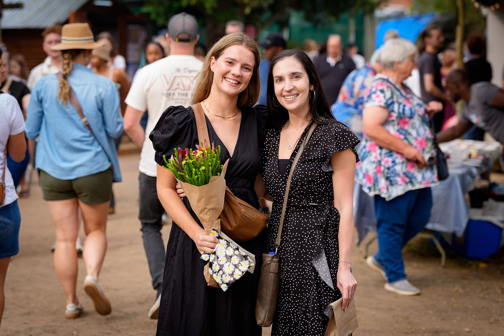 Ladies posing for a photo at the Pretoria Boeremark