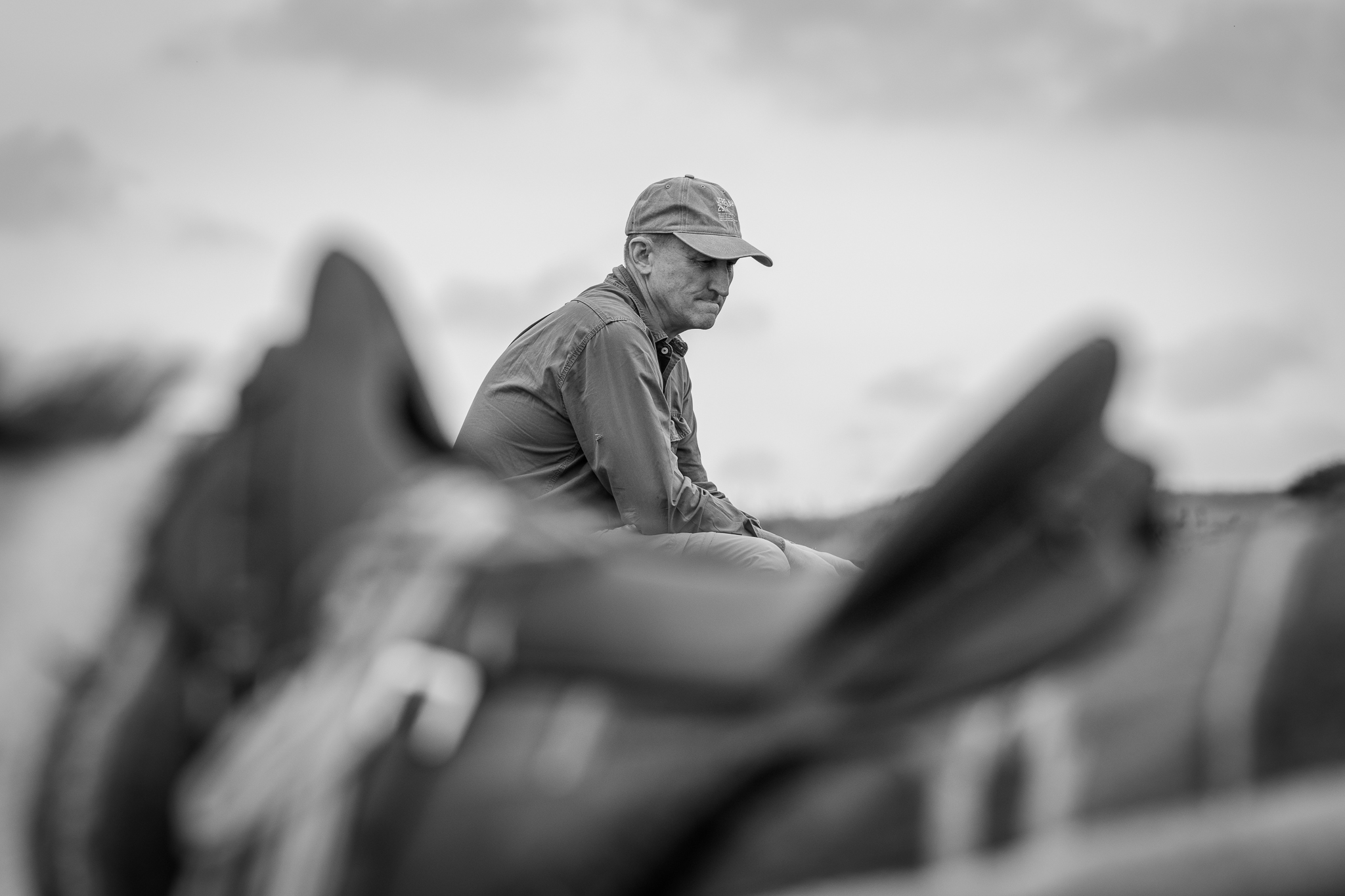 Black and white portrait of a farmer deep in thought