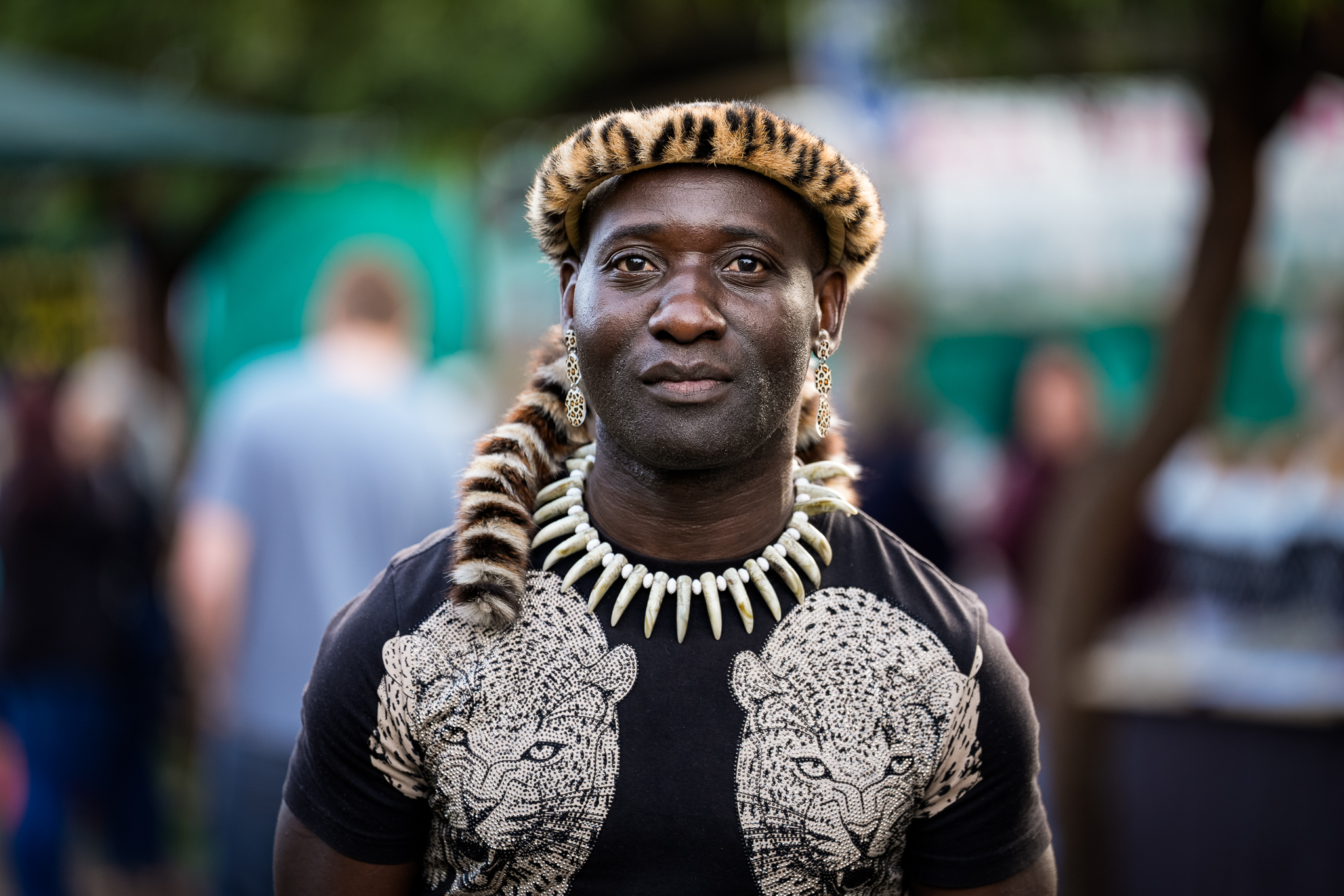 A Zulu man poses for the camera at a local market