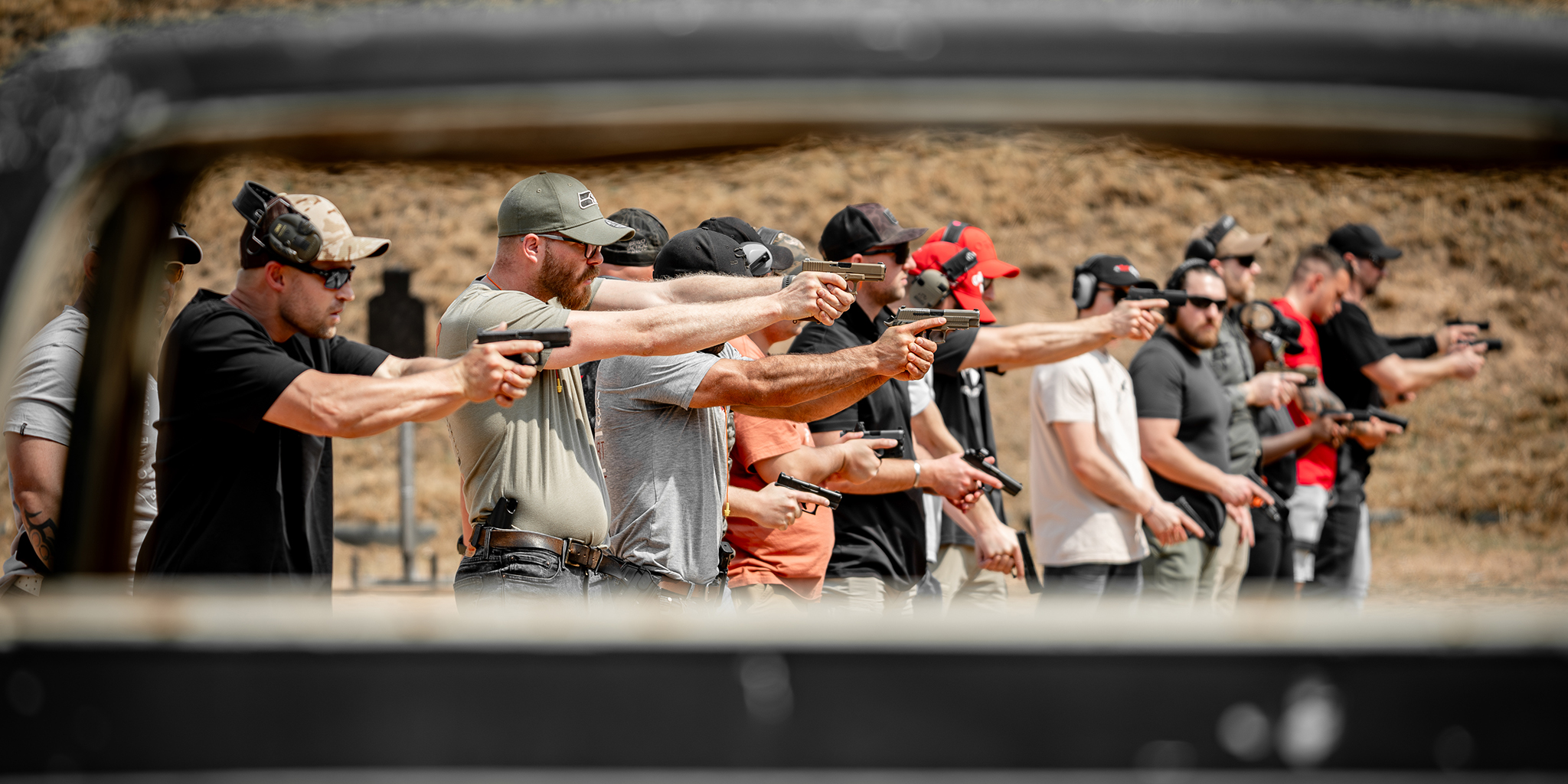 Candid image of a group of shooters at a shoot at Wattle Springs Shooting club