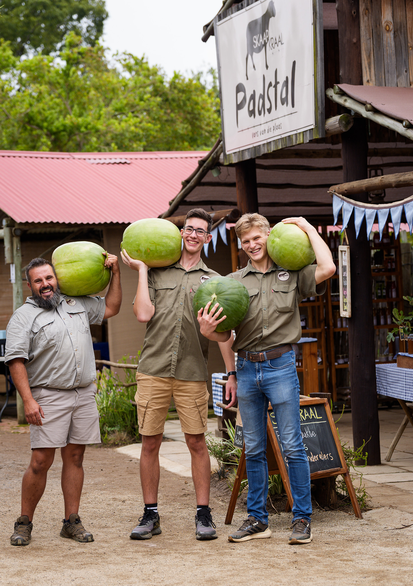 Vendors posing with watermelons at the Skaapkraal at Pretoria Boeremark