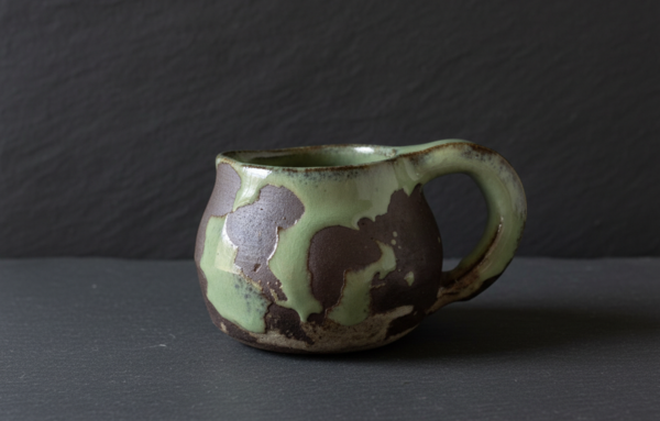 Celadon on Black pitcher