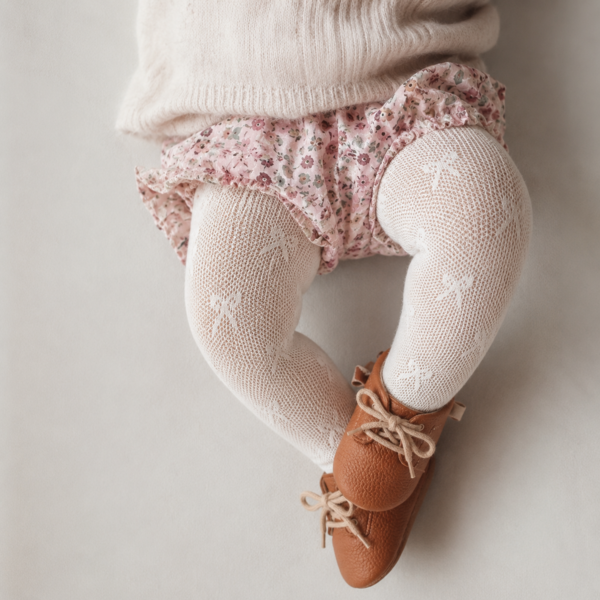 Baby bow pattern tights light cream