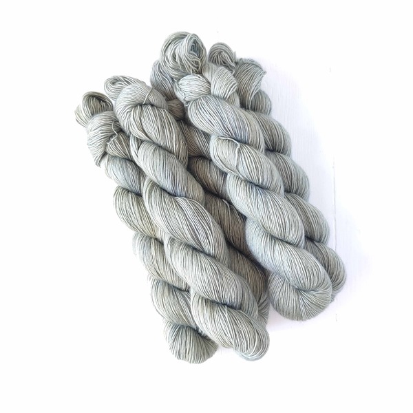 Kooigoed is also a new neutral - a medium pale silvery sage colour. It has a greyish base, and a slightly 'oxidised' appearance  - so it leans more to the 'cool' side of the greens - and will pair well with the delicate pastels currently listed.
Kooigoed is a lovely, indigenous fragrant plant - it's known as the silver bush everlasting, impepho or liquorice plant, and has numerous practical uses. Traditionally, it was used for bedding and mattresses (conveniently insect repellent too) - hence the Afrikaans name which translates as 'bedding stuff'. It is also burned as incense - to clear energy, create calm or commune with the ancestors. 
Care Instructions: For long term fibre and colour care a gentle, PH neutral detergent (preferably natural/organic) and cold water rinse is recommended. Refrain from excessive wringing. Dry flat, avoiding prolonged exposure to harsh sunlight.
