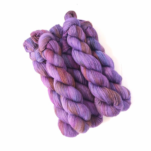 Imperial is a saturated and dramatic jewel-like variegated colourway - combining shades of rich, royal purple and tyrian reddish purples that will make it a delightful colourwork skein.
Care Instructions: For long term fibre and colour care a gentle, PH neutral detergent (preferably natural/organic) and cold water rinse is recommended. Refrain from excessive wringing. Dry flat, avoiding prolonged exposure to harsh sunlight.