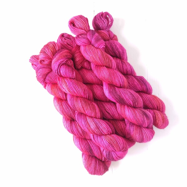 Frida is an intense, saturated rich velvety pink variegated colourway - intense shades of hot pink, Cerise and electric rose combine to provide a juicy pop of colour. (...as inspiration - check out Nicholas Maray's photos of the artist Frida Kahlo)
Please take care with this colourway: avoid prolonged soaking if using with lighter colours; and only use cold water. 
Care Instructions: For long term fibre and colour care a gentle, PH neutral detergent (preferably natural/organic) and cold water rinse is recommended. Refrain from excessive wringing. Dry flat, avoiding prolonged exposure to harsh sunlight.
