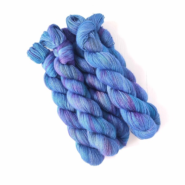 One of my favourite flowers has always been cornflowers - so this colourway reminds me of them. Shades of brilliant cornflower blue, violets and royal blue combine together in this subtly layered variegated skein. Cornflowers will do well with neutrals, and create a clean, summery combination.
Care Instructions: For long term fibre and colour care a gentle, PH neutral detergent (preferably natural/organic) and cold water rinse is recommended. Refrain from excessive wringing. Dry flat, avoiding prolonged exposure to harsh sunlight.