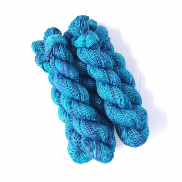 Coastal is a deep variegated colourway inspired by the oceans - rich shades of marine blue and turquoise combine to create a summery, oceanic vibe...
Care Instructions: For long term fibre and colour care a gentle, PH neutral detergent (preferably natural/organic) and cold water rinse is recommended. Refrain from excessive wringing. Dry flat, avoiding prolonged exposure to harsh sunlight.