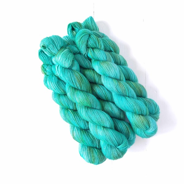 It's no secret....I am a fan of all things turquoise...and so a bunch of these shades in this update! For me, it is an energising colour - in line with the sacred amulet associations of  rebirth, transformation, protection and good fortune.
Nile Scarab is a delicately variagated colourway with shades of 'greenish' turquoise - it is quite saturated so will add a lively pop of colour to projects.
If fades are your thing - Vagabond, Nile Scarab and Verdigris make a lovely fade set...
Care Instructions: For long term fibre and colour care a gentle, PH neutral detergent (preferably natural/organic) and cold water rinse is recommended. Refrain from excessive wringing. Dry flat, avoiding prolonged exposure to harsh sunlight.
 