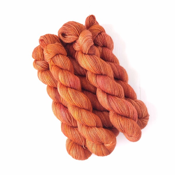 One of South Africa's best known exports is Rooibos tea - and what glorious colour it produces. This colourway is a very subtle variageted colour - shades of burnt orange, pumkin spice and autumnal fiery tones make up the hues contained within it.
Care Instructions: For long term fibre and colour care a gentle, PH neutral detergent (preferably natural/organic) and cold water rinse is recommended. Refrain from excessive wringing. Dry flat, avoiding prolonged exposure to harsh sunlight.