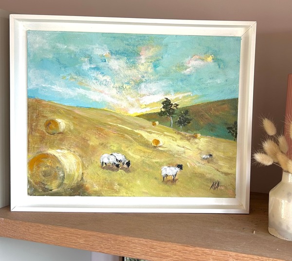 Sheep Among the Hay Bales